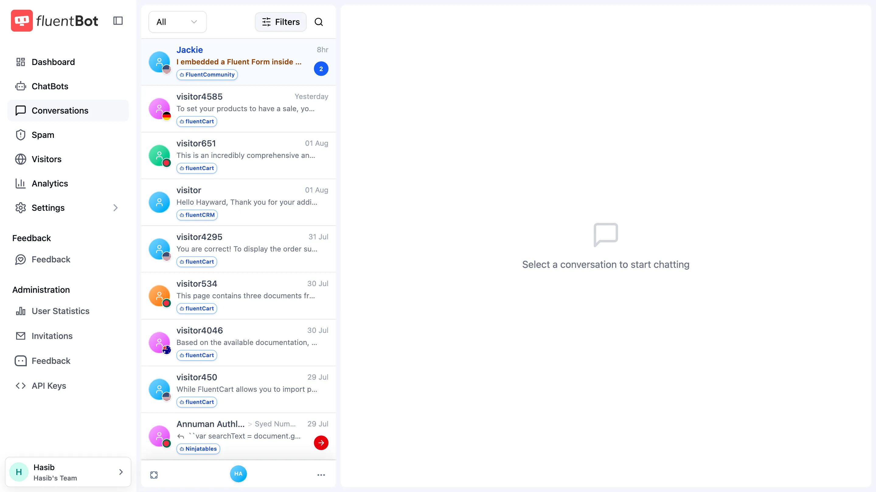 Conversations inbox showing visitor chat rows with bot tags and the selected-conversation placeholder